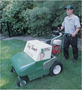 lawn technician power seeding in Overland Park